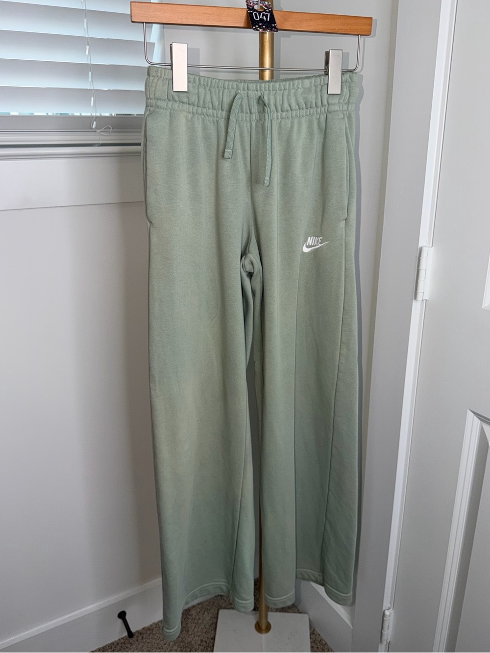 47. Nike Club Fleece mid-rise wide-leg sweatpants in Jade Horizon